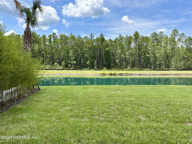 view of yard with a water view