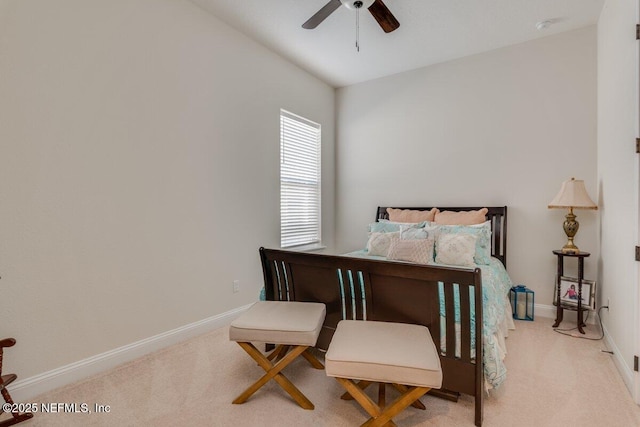 bedroom with light colored carpet and ceiling fan