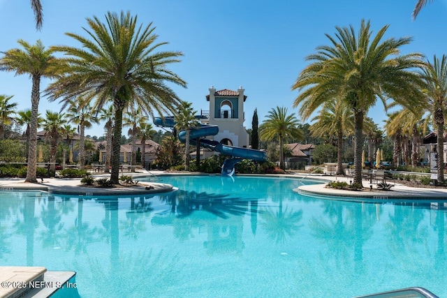 view of pool featuring a water slide