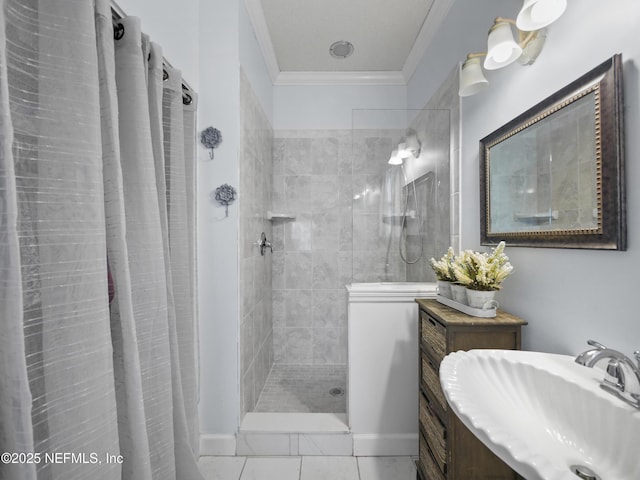 bathroom featuring a tile shower, sink, tile patterned floors, and ornamental molding