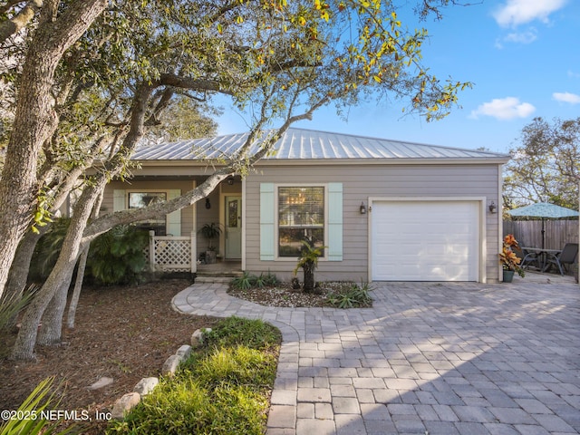 single story home with a garage