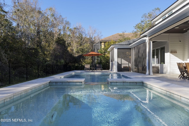 view of pool featuring a patio area