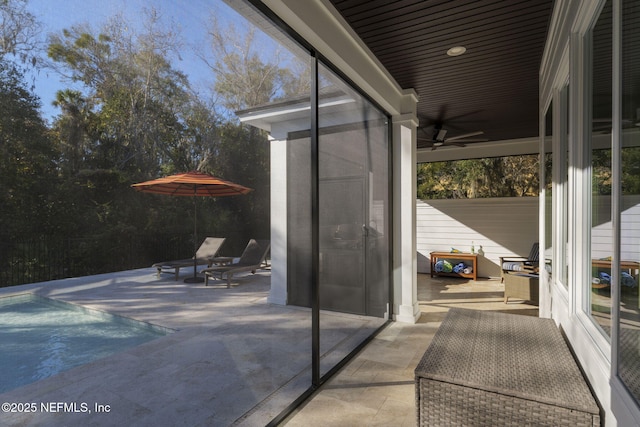 view of patio with ceiling fan