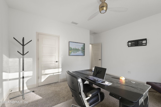 office space featuring light colored carpet and ceiling fan