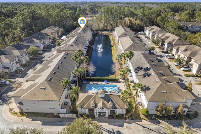 drone / aerial view with a water view