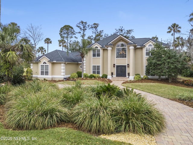 view of front of house with a front lawn