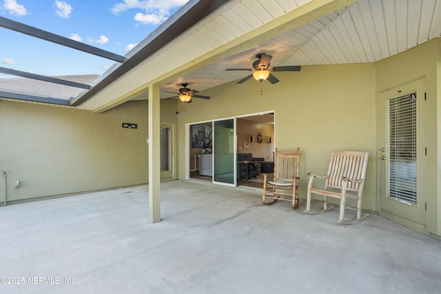 view of patio featuring ceiling fan