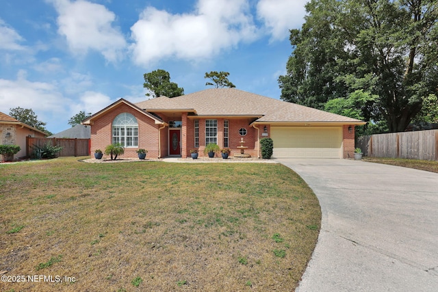 ranch-style home with a garage and a front yard