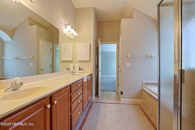 bathroom with vanity, tile patterned floors, and plus walk in shower