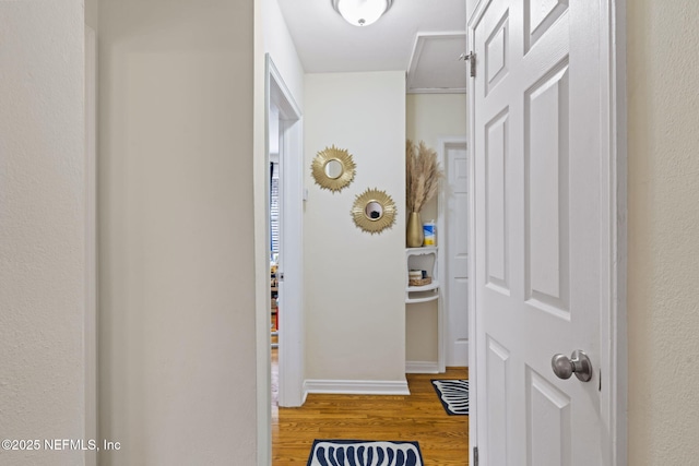 corridor featuring hardwood / wood-style flooring