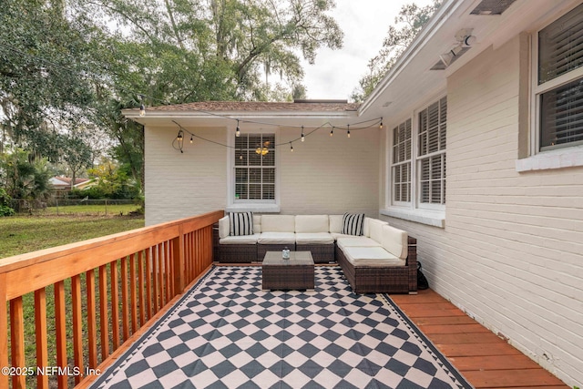 deck featuring outdoor lounge area