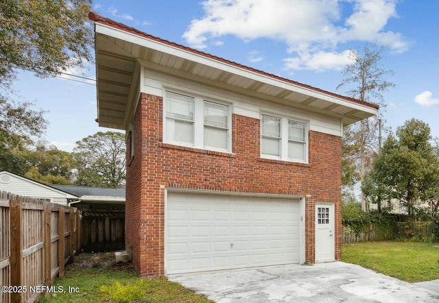 view of home's exterior featuring a garage and a yard