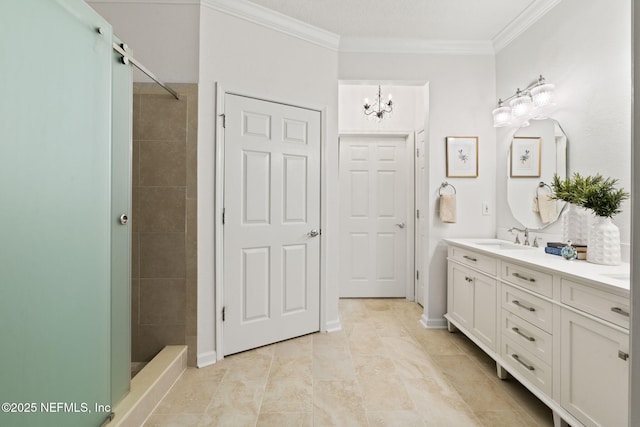 bathroom with tile patterned flooring, an inviting chandelier, tiled shower, vanity, and ornamental molding