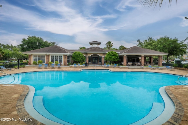 view of swimming pool featuring a gazebo and a patio