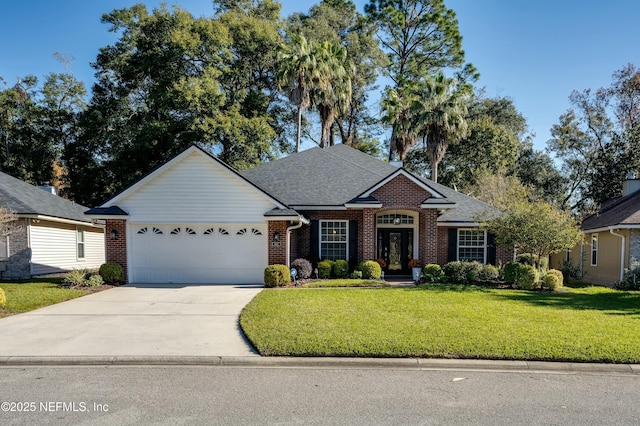 view of front of house with a garage and a front lawn