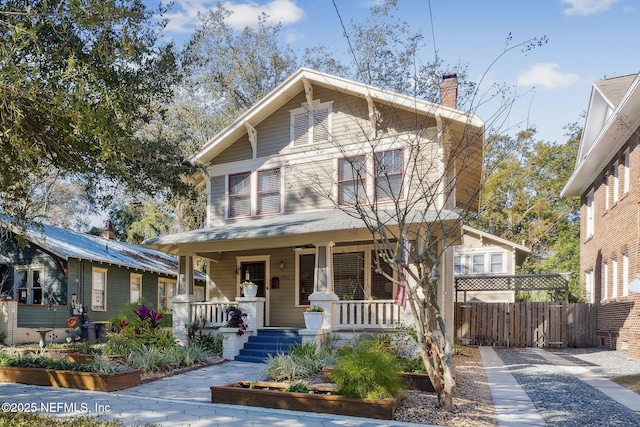 view of property featuring a porch