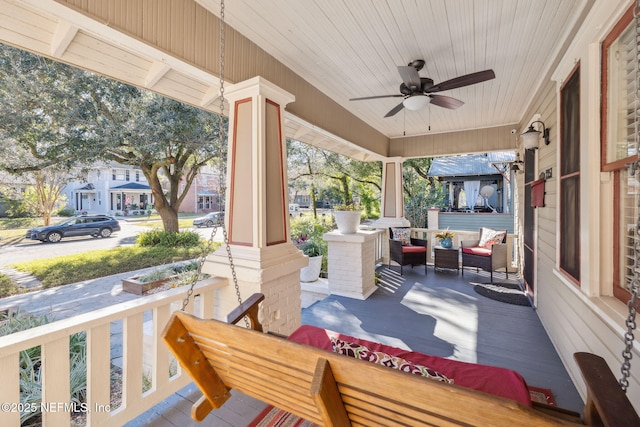 view of patio / terrace featuring covered porch and ceiling fan