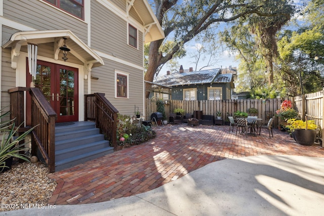 exterior space with a patio area and french doors