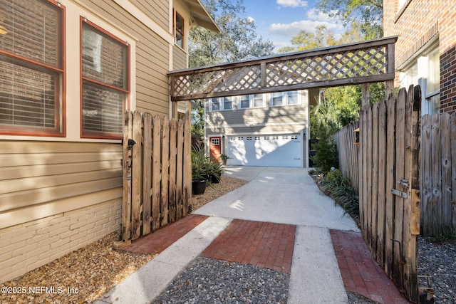 exterior space featuring an outbuilding and a garage