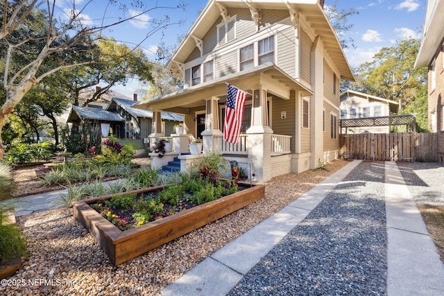 view of front of property featuring covered porch