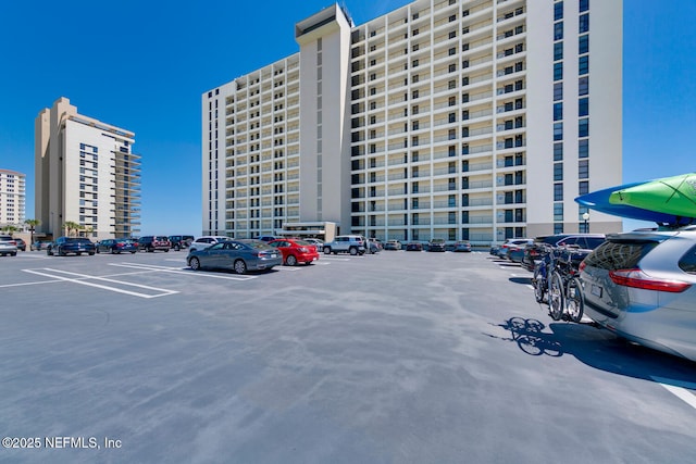 view of property with uncovered parking