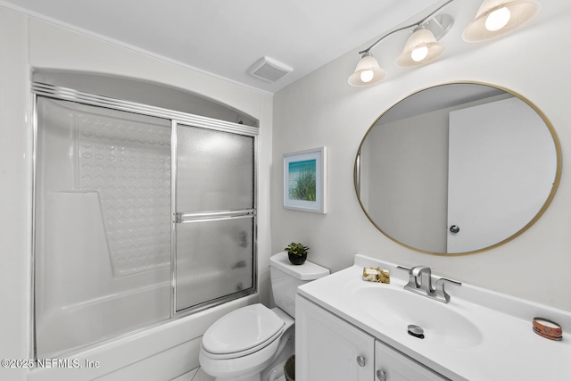 bathroom featuring visible vents, bath / shower combo with glass door, vanity, and toilet