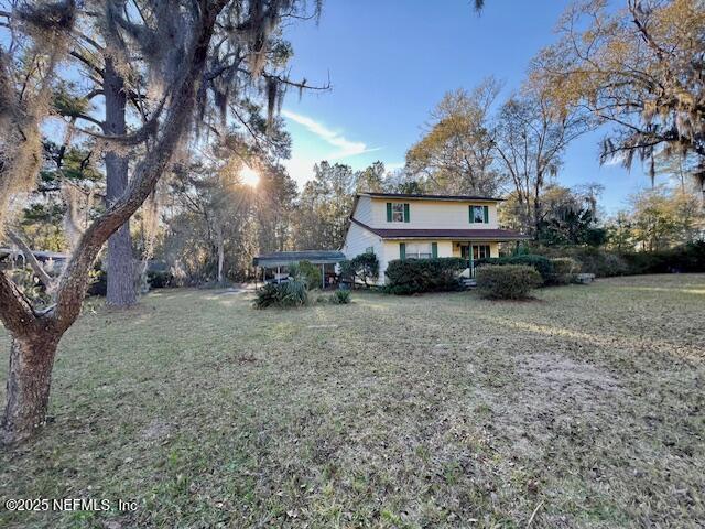 exterior space with a front yard