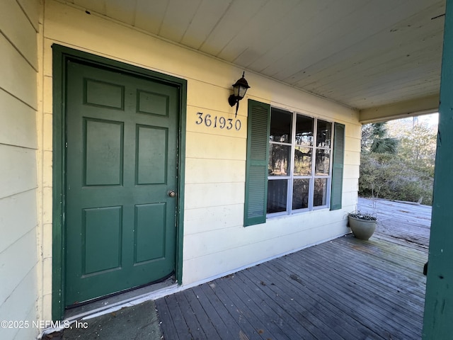 entrance to property with covered porch