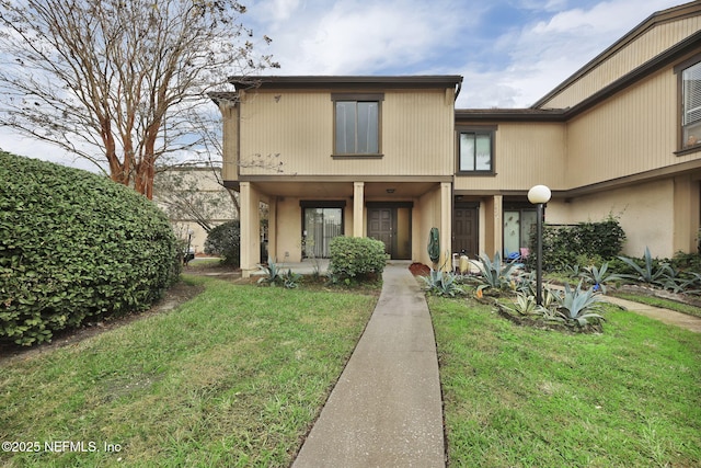 view of front of property with a front yard