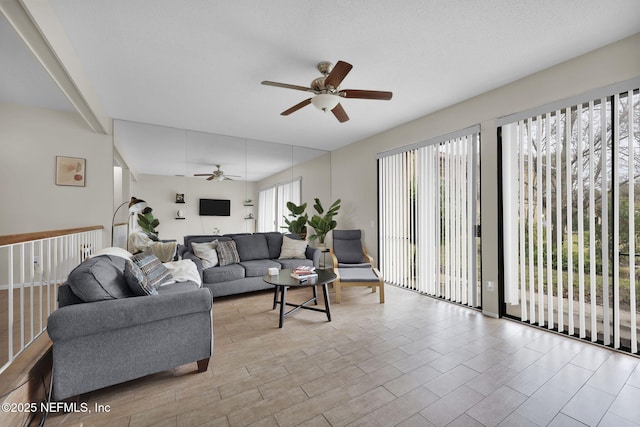 living room featuring ceiling fan