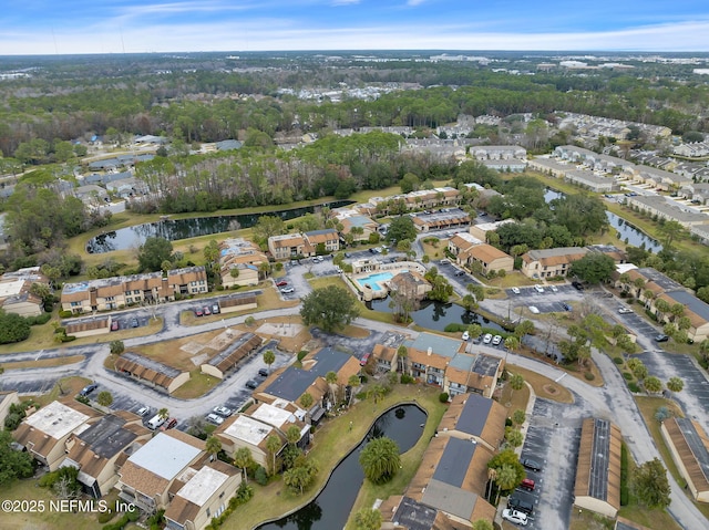 bird's eye view with a water view