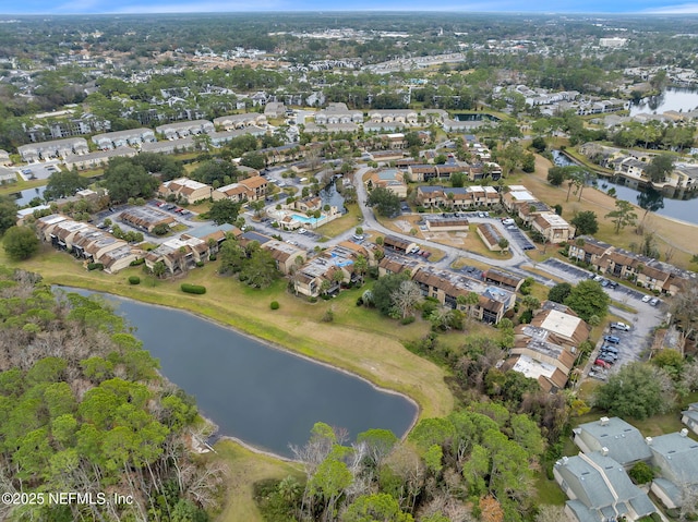 bird's eye view with a water view