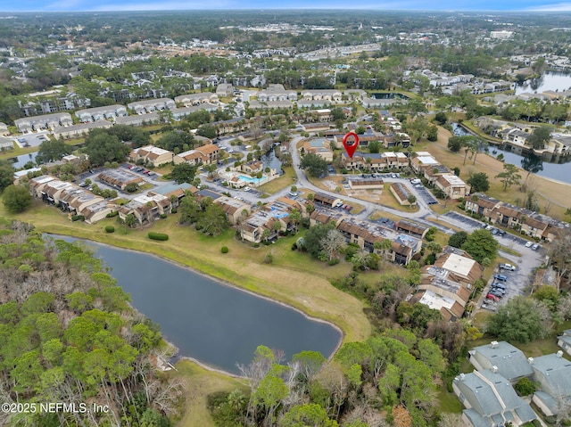 drone / aerial view with a water view