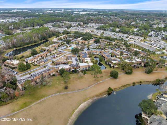 drone / aerial view featuring a water view