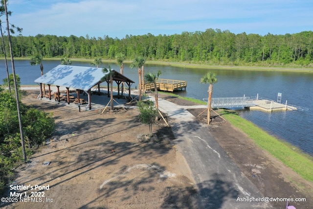 dock area with a water view and a gazebo