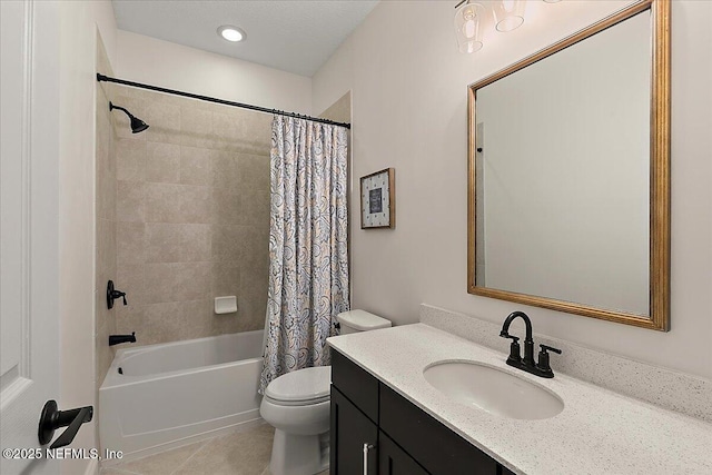 full bathroom with vanity, shower / tub combo, tile patterned floors, and toilet