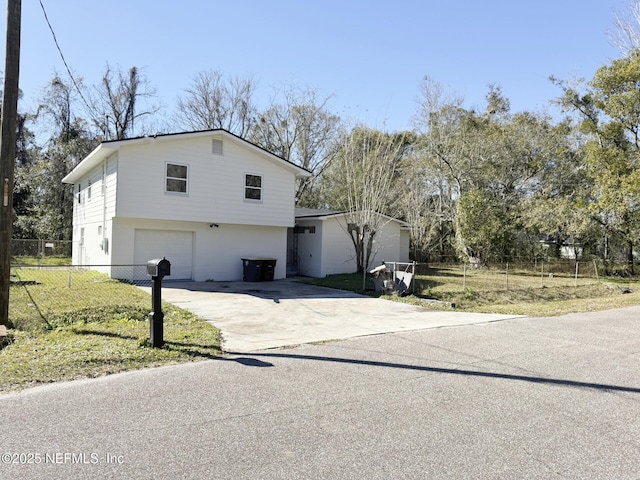 view of front of house with a garage