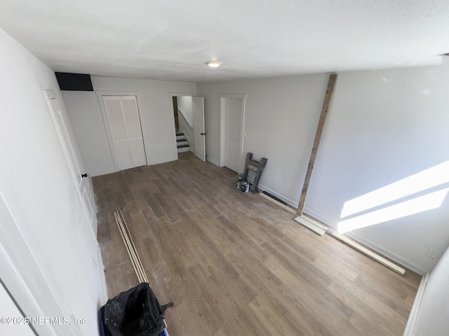 spare room featuring hardwood / wood-style flooring