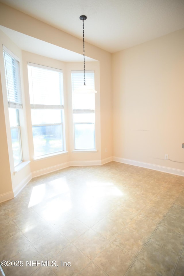 interior space featuring light tile patterned floors