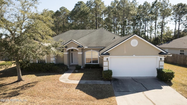 view of front of property featuring a garage