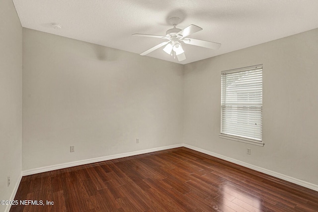 empty room with wood-type flooring, a textured ceiling, and ceiling fan