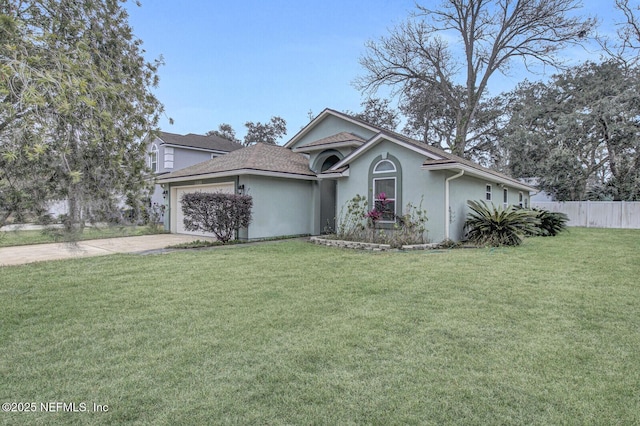 view of front of house with a garage and a front yard