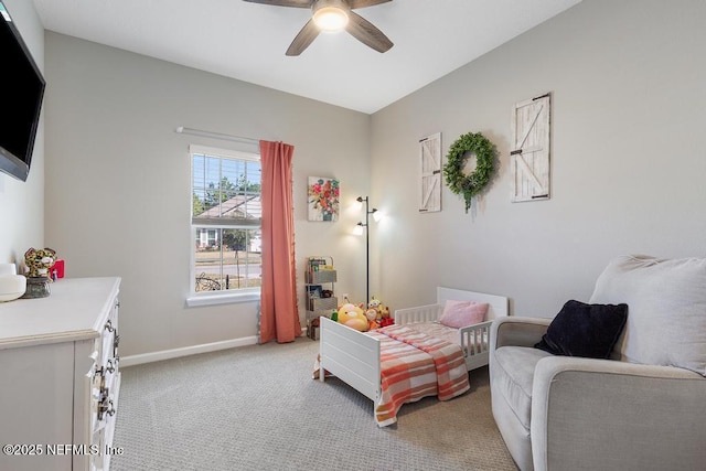 bedroom with ceiling fan and light colored carpet