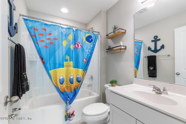 full bathroom featuring toilet, vanity, and shower / tub combo with curtain