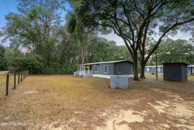 view of yard with a shed