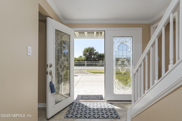 entrance foyer with crown molding