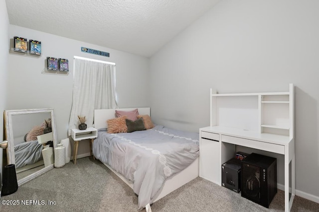 bedroom featuring light colored carpet, a textured ceiling, and lofted ceiling