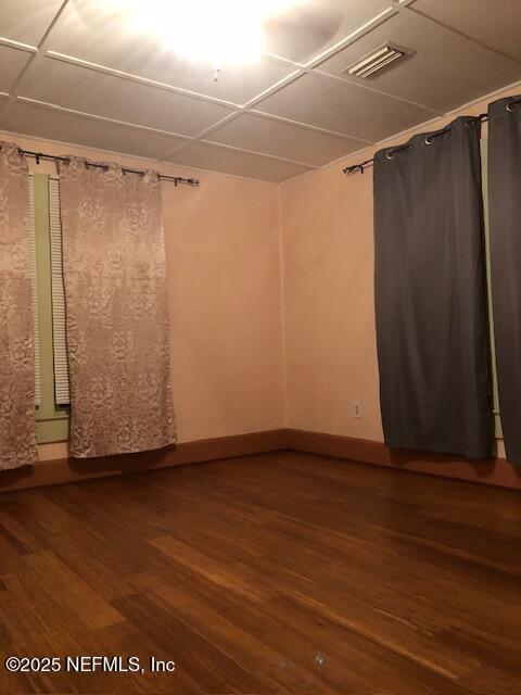 empty room featuring hardwood / wood-style floors