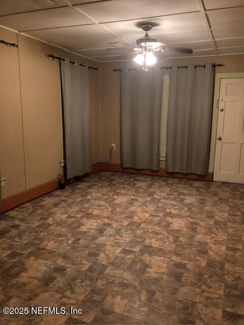 basement featuring ceiling fan