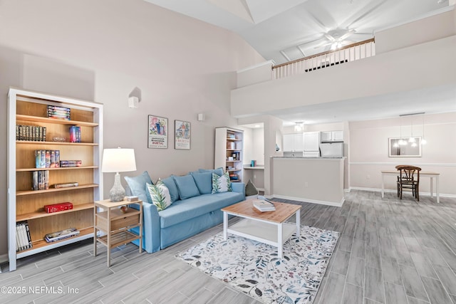 living room with a towering ceiling